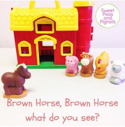 Brown horse and a barn